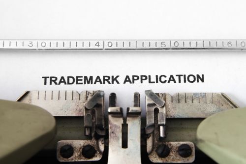 Close up of typewriter on Trademark application form - Trademark filing basis concept